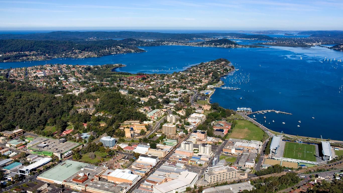 Aerial View of a City Surrounded by Fields and Trees — JP Civilworx Pty Ltd in Gosford, NSW