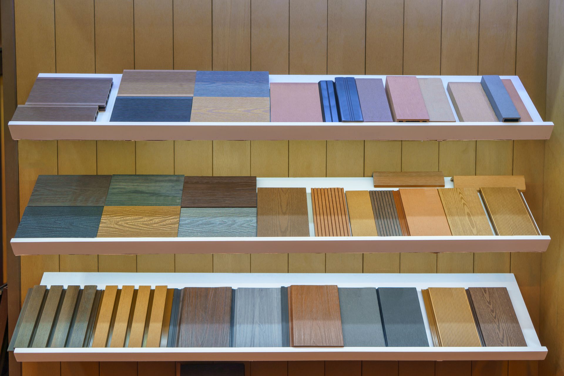 Three shelves filled with different types of roof