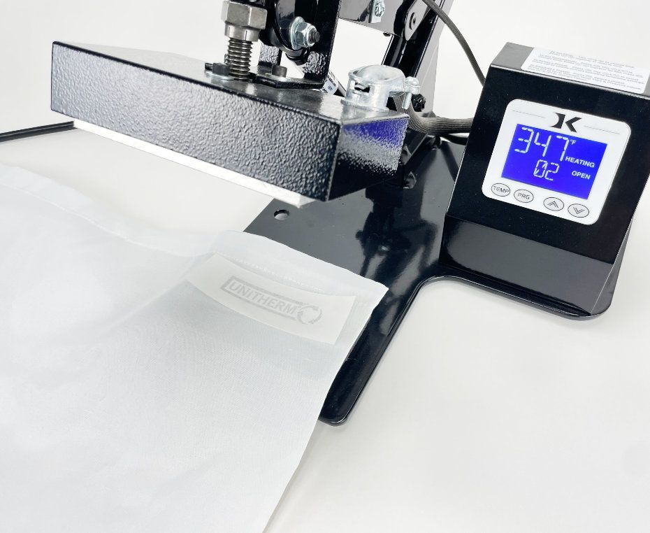 Unitherm's Iron On Transfer being applied to linen with the U35 Heat Seal Machine