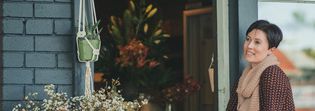 Woman At Flower Shop — Florists In Woolgoolga, NSW