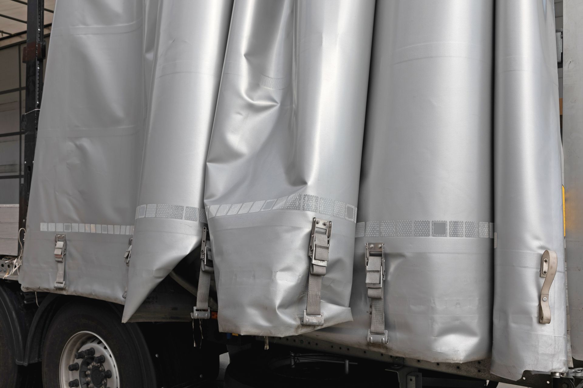 Canvas-sided truck trailer for cargo transportation