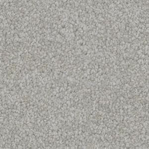 A close up of a gray carpet texture.