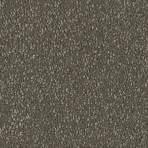 A close up of a gray carpet texture.