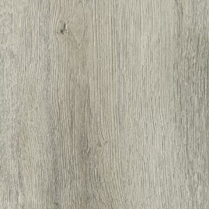 A close up of a piece of wood showing the grain and texture.