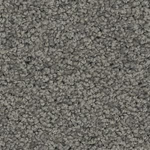 A close up of a gray carpet texture.