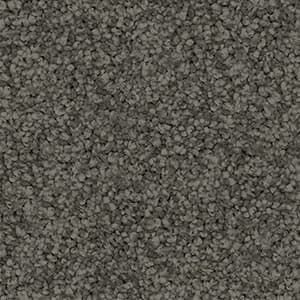 A close up of a gray carpet texture.