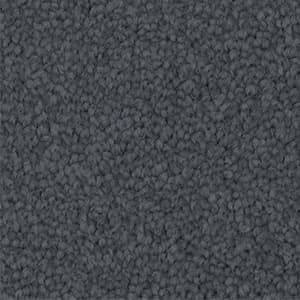 A close up of a gray carpet texture.