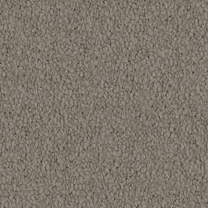 A close up of a gray carpet texture.