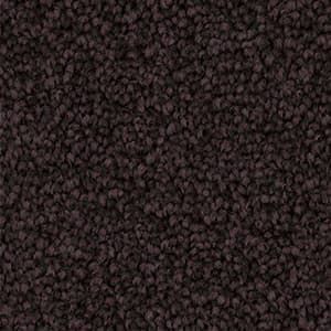 A close up of a brown carpet texture.