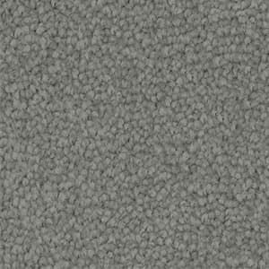 A close up of a gray carpet texture.