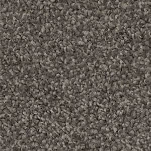 A close up of a gray carpet texture.