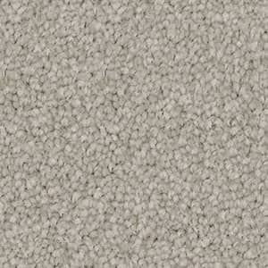 A close up of a gray carpet texture.