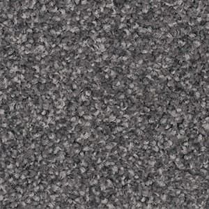 A close up of a gray carpet texture.