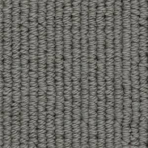 A close up of a gray carpet texture.