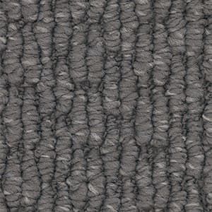 A close up of a gray carpet texture.