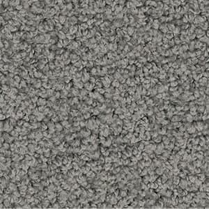 A close up of a gray carpet texture.