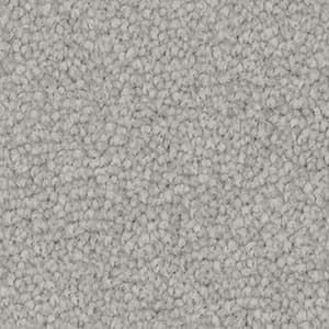 A close up of a gray carpet texture.