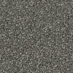 A close up of a gray carpet texture.