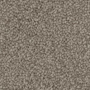 A close up of a carpet with a lot of small dots on it.