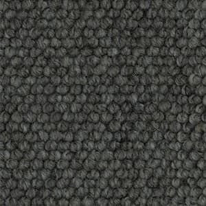 A close up of a gray carpet texture.