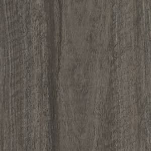 A close up of a gray wood grain texture.