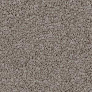 A close up of a grey carpet texture.