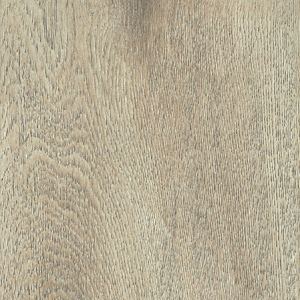 A close up of a piece of wood showing the texture of the wood.
