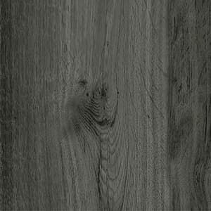 A close up of a piece of gray wood.