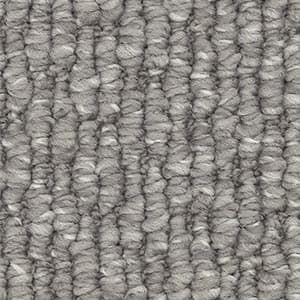 A close up of a gray carpet with a striped pattern.