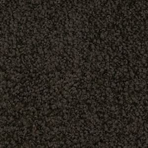 A close up of a brown carpet texture.