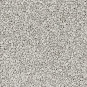 A close up of a white carpet texture.