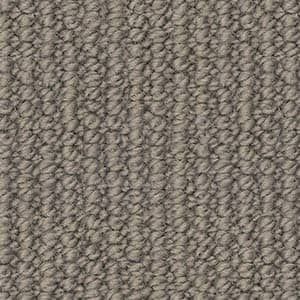A close up of a grey carpet texture.