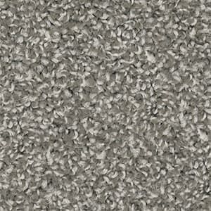 A close up of a gray carpet texture.