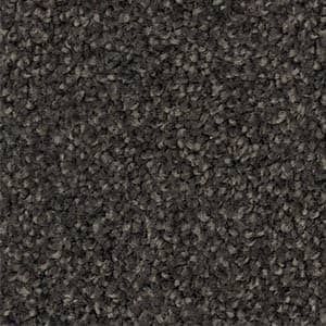 A close up of a gray carpet texture.