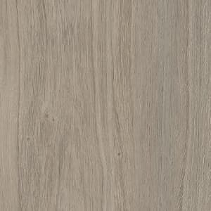 A close up of a piece of wood showing the texture of the wood.