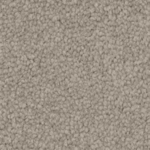 A close up of a grey carpet texture.