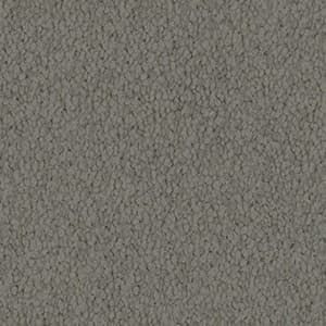 A close up of a gray carpet texture.