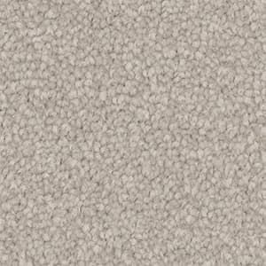A close up of a white carpet texture.