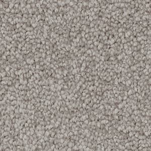 A close up of a grey carpet texture.