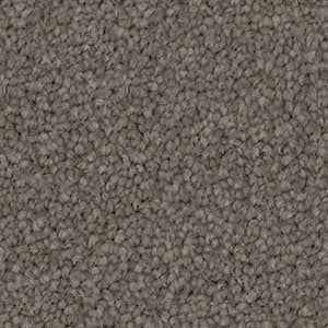 A close up of a gray carpet texture.