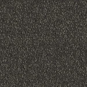 A close up of a gray carpet texture.