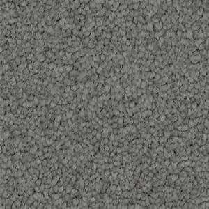 A close up of a gray carpet texture.
