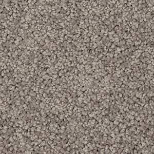 A close up of a grey carpet texture.