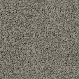 A close up of a gray carpet texture.
