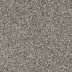 A close up of a grey carpet texture.