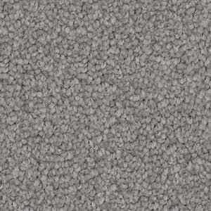 A close up of a gray carpet texture.