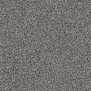 A close up of a gray carpet texture.