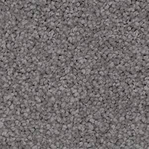 A close up of a gray carpet texture.