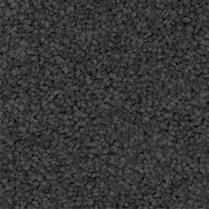 A close up of a gray carpet texture.