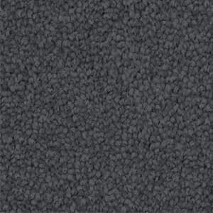A close up of a gray carpet texture.